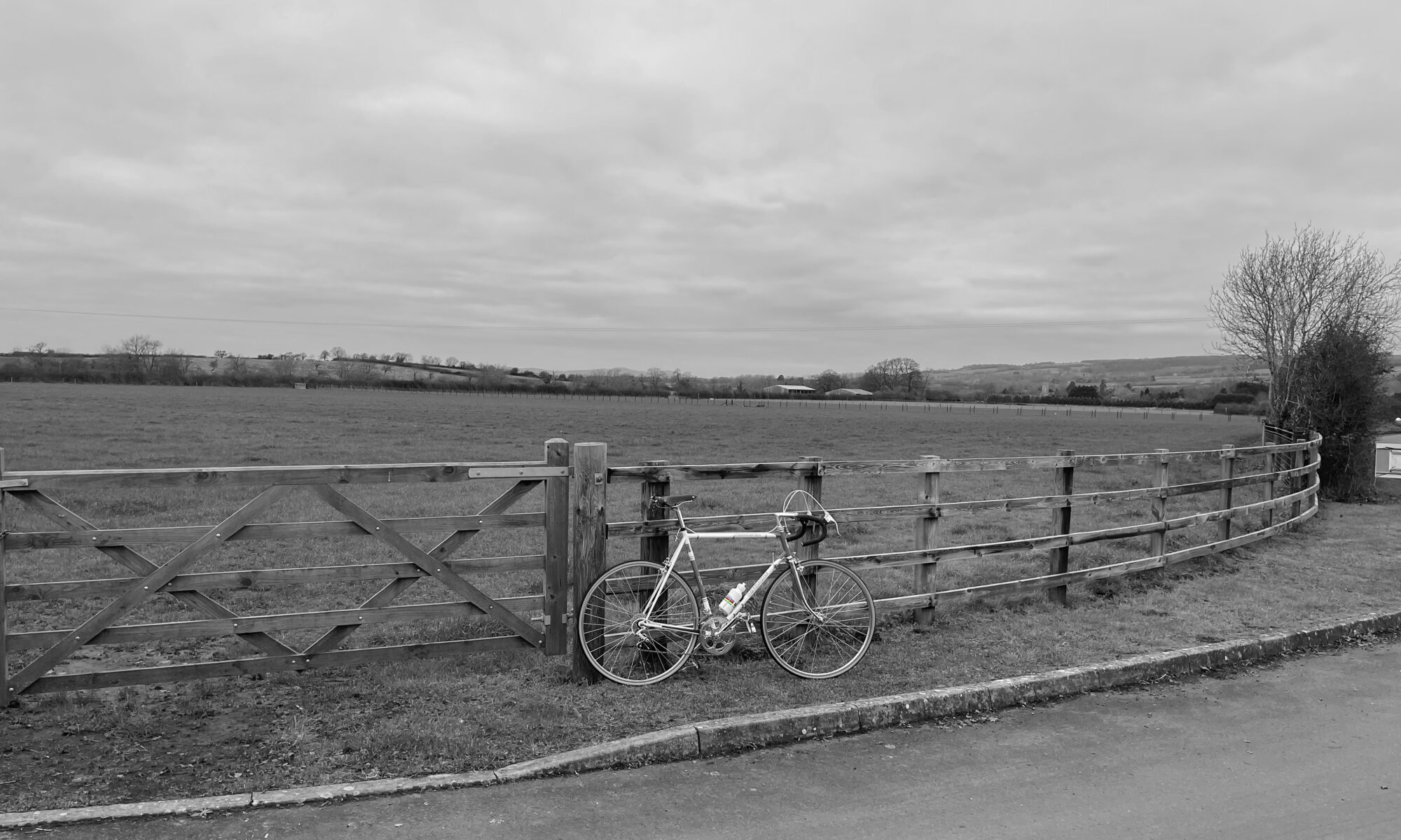 a black and white image of a retro bike in the Cotswolds